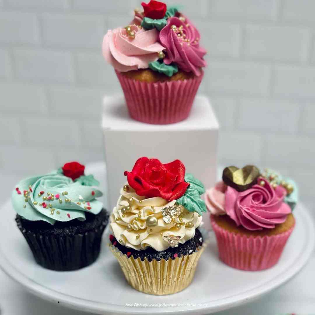 Assorted wedding cupcakes, beautifully decorated with pink, gold or green icing from Millie Rose, Timaru.