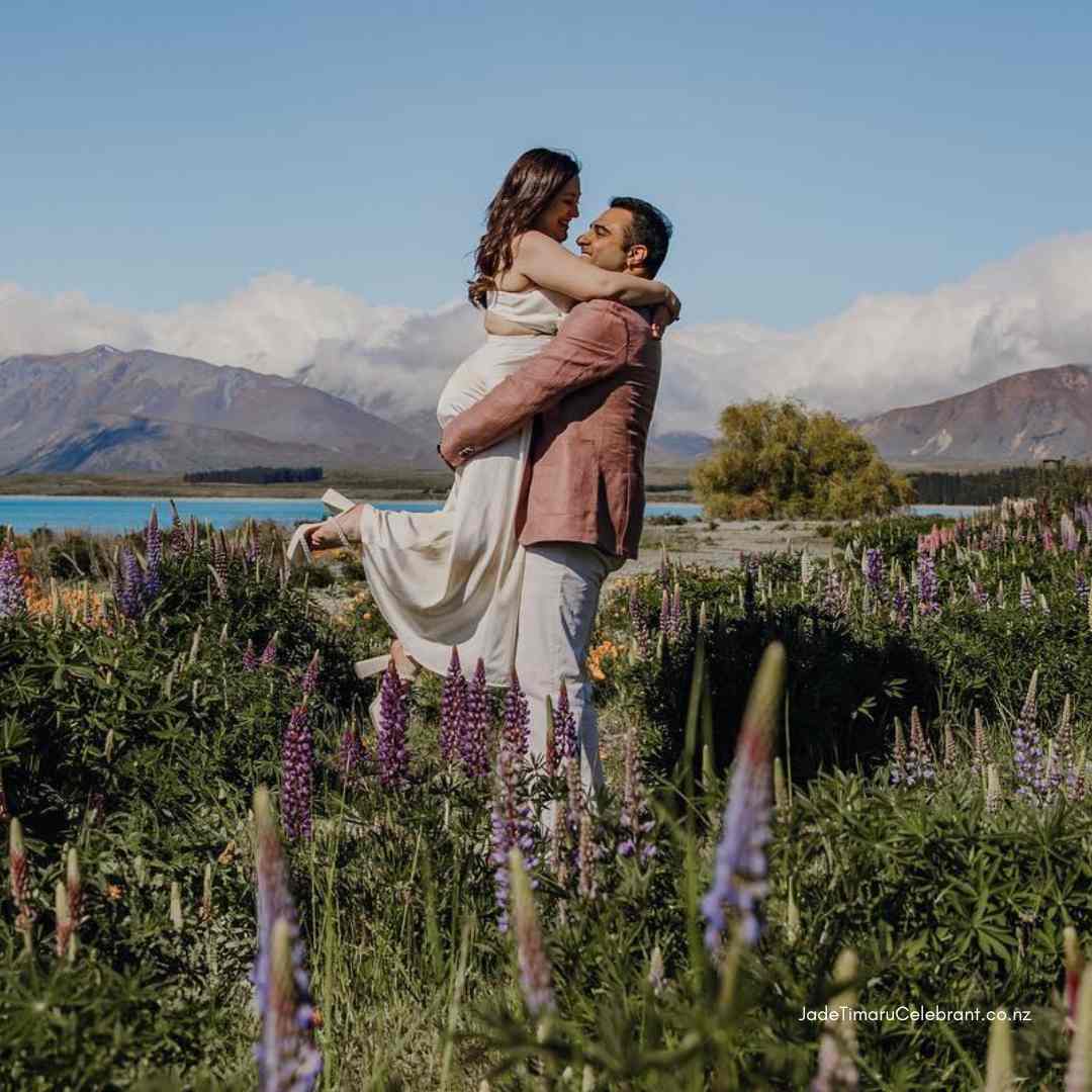 Elopement Wedding at Lake Tekapo lupins with Jade Marriage Celebrant's Packages. Photo Beth Lambourne